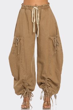 Embrace the perfect blend of style and utility with our Urban Chic Drawstring Denim Cargo Pants! These pants feature an adjustable drawstring waist and cuffs, providing a customizable fit while adding a trendy streetwear-inspired vibe. Crafted from high-quality denim, they offer both comfort and durability, perfect for pairing with any outfit. Elevate your look with these versatile and stylish pants! Medium inseam 27.5 75% Cotton 25% Polyester Denim Cargo Pants, Jeans Overall, Baggy Pants, Baggy Style, Trendy Streetwear, Jeans Cargo, Urban Fashion Women, Denim Chic, Stylish Pants