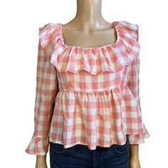 Entro Womens Ruffle Peplum Blouse Checkered Plaid Pink White Tied Back Small. Size: Small Pink/White Bust: 32 1/2 To 34 In Waist: 29 In Length: Approx 20 In In Excellent Condition New With Tags. Peplum Blouse. Ruffley. Ties In The Back. Bracelet Length Sleeves. Smocking In The Back. Woven Cotton Material. Cute Checkered Plaid Print. Short In Length Borderlining Cropped. Cute Brunch Tops With Ruffle Hem, Summer Plaid Blouse For Day Out, Cute Spring Tops With Ruffle Hem, Cute Gingham Long Sleeve Tops, Chic Plaid Blouse For Daywear, Cute Ruffled Tops For Brunch, Long Sleeve Gingham Top For Summer, Cute Fitted Blouse For Brunch, Spring Gingham Blouse With Ruffles