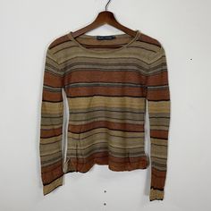 [DESCRIPTION] Please read the description first before buy my items‼️‼️ Vintage Ralph Lauren Drawstring Honeycomb Knitwear Size on tag : S Tag says S,fits like XXS (please refer the actual measurements given and compare it with best fitting clothes,by using the size on tag is not always accurate) All in good condition [MATERIAL] Cotton [MEASUREMENT] Measurement:  armpit to armpit : 16.5 inches  Back collar to bottom : 21 inches Sleeve length from under armpit to end of cuff : 17 inches [CONDITIO Striped Long Sleeve Fine Knit Top, Striped Fine Knit Long Sleeve Top, Striped Long Sleeve Knit Top For Fall, Striped Knitted Tops For Layering, Striped Knitted Long Sleeve Tops, Striped Long Sleeve Fine Knit Sweater, Striped Fine Knit Long Sleeve Sweater, Brown Fine Knit Crew Neck Top, Striped Crew Neck Knit Top For Fall