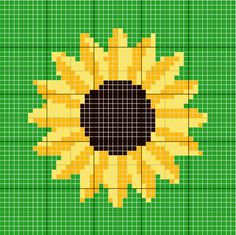 a cross stitch sunflower on a green background with black center and yellow petals in the middle