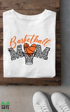 a t - shirt that says basketball mom with a basketball in the hoop on it