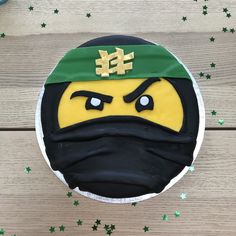 a cake decorated to look like a ninja face