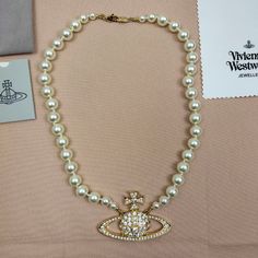 "Brand New With Box,Dust Pouch And Cloth 1 Row Faux Pearl Bas Relief Necklace Approx Longth 20” Saturn It Is Large, Approx 2.5” Long X 1.5” H Metal Brass Alloy Accept Reasonable Offer" Vivienne Westwood Designs, Vivienne Westwood Jewelry, Dope Jewelry Accessories, Dope Jewelry, Ruby Necklace, Bas Relief, Jewelry Lookbook, Pretty Jewellery, Vivienne Westwood