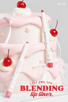 a cake with two crayons on it and the words for you to blending lip liner