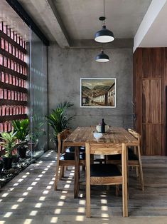 a wooden table sitting in the middle of a room