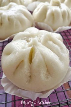 some dumplings are sitting on a cooling rack