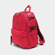 Sturdy woven fabric for durability.Front zipper pocket provides easy access.Main compartment features wall pocket for small items.Padded and adjustable shoulder straps.Zipper closures.100% polyester.10” H x 6.5” W x 3” D.The Air Jordan Mini Backpack (Small) is imported..Don’t let its small size fool you — the Kids' Air Jordan Mini Backpack (Small) still has plenty of room for your essentials in a stylish and smaller Jordan package. Small Luggage, Heeled Rain Boots, High Heel Rain Boots, Shoe Boot Sandals, Backpack Tote Bag, Kids Jordans, Boot Accessories, Travel Collection, Mini Backpack