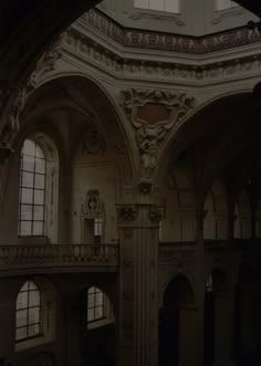 the interior of an old building with arched windows