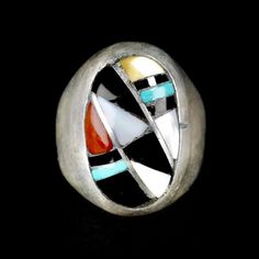 Wonderful Vintage Zuni Ring by Ralph and Lillie Kallestewa, they have been active jewelers since the 1950s.This ring is a  Multi Stone Sterling Silver Inlay, with Turquoise, Jet, Mother of Pearl and Coral.  This ring will look great on both men and women. Size 10 1/2 Measures 1 " tall Weight 18.9 grams Art Deco Multi-stone Collectible Jewelry, Multicolor Inlay Rings For Anniversary, Anniversary Multicolor Inlay Rings, Southwestern Style Rings With Inlay, Southwestern Round Rings With Inlay, Vintage Silver Multi-stone Opal Ring, Artisan Rings With Inlay For Anniversary, Oval Multicolor Rings For Collectible, Oval Multicolor Rings For Collectors