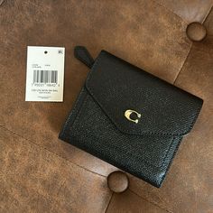 Nwt Coach Wyn Small Wallet Coach Crossgrain Leather Wyn Small Wallet Never Used. Product Details And Dimensions Listed In Pictures. Pet Free/Smoke Free Home. Feel Free To Ask Questions. Coach Wyn Wallet, Luxury Coach Wallets For Formal Occasions, Elegant Coin Purse With Rfid Blocking For Daily Use, Elegant Rfid Blocking Coin Purse For Daily Use, Elegant Compact Trifold Wallet For Everyday Use, Elegant Compact Trifold Wallet For Daily Use, Elegant Rfid Blocking Coin Purse, Chic Coach Wallets For Daily Use, Formal Coach Coin Purse With Coin Pocket