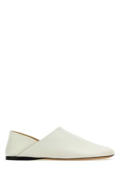 White Leather Toy Loafers from Loewe White Slip-on Flats With Rubber Sole, Modern White Slip-on Loafers, White Slip-on Flat Slippers, White Slip-ons With Rubber Sole And Flat Heel, Cream Leather Flat Slip-ons, White Leather Slip-on Loafers, White Slip-on Loafers With Textured Sole, White Slip-on Loafers With Leather Footbed, White Closed Toe Flats With Textured Sole