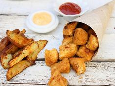 some fried food on a white wooden table