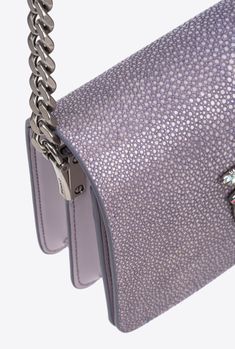 Mini Love Bag Click in buffed stingray leather, which is slightly coarse to the touch and very shiny. The concealed press-stud fastening is accompanied by the iconic Love Birds Diamond Cut metal buckle, complete with a cut-out effect and pavé rhinestone detail. Inside, it features contrasting lining, a slip pocket and a zipped divider pocket. The shoulder strap combines the classic round-link chain with a practical, adjustable leather pad. The bag is part of the Limited Edition special capsule c Mini Love, Belt Purse, Bag Icon, Capsule Collection, Mid Length Dresses, Stingray, Press Studs, Love Birds, Metal Buckles