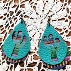 Western style Cactus and Serape drop earrings. Faux leather and nickel. Made to order. Solid color can be customized. 2" Leather Cactus Earrings, Princess Cookies, Easter Egg Cookies, Granddaughter Birthday, Cactus Earrings, Western Style, Creative Ideas, Western Fashion, Jewelry Earrings Dangle