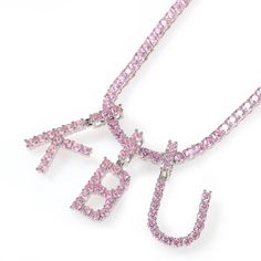 Bling Initial Name Necklace made with sterling silver and gold placements. Luxury Silver Initials Necklace, Luxury Silver Necklaces With Initials, Elegant Pink Initial Pendant Necklaces, Elegant Pink Engraved Necklace, Pink Initials Jewelry As A Gift, Pink Initials Jewelry Gift, Pink Engraved Pendant Jewelry, Engraved Pink Pendant Jewelry, Silver Initial Pendant For Jewelry Making