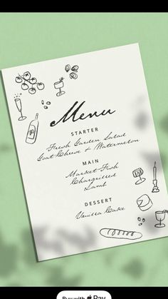 the menu for an event is displayed on a green background with white paper and black ink