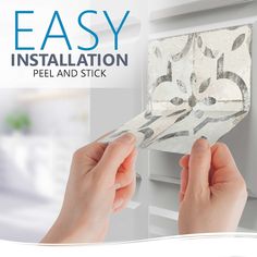 a person is holding up a piece of paper with the words easy installation peel and stick on it