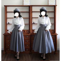 A classic corset skirt, cavalier blouse, and short cape for a classy lady. It features a high-waisted silhouette with a strong presence, and the fluffy skirt part gives it an elegant atmosphere. Try pairing it with a cavalier blouse with a bust. 
 
 

 

 
 
 Item 
 
 Skirt (black/gray) 
 Blouse (black, white, red, navy) *With chest decoration 
 Cape (black/gray) 
 
 
 Size 
 
 
 Skirt 
 
 S size 
 
 Total length: 87cm (*waist part: 11cm) 
 Waist: 58-72cm 
 
 M size 
 
 Total length: 87cm (*wais Spring Vintage Dress For Costume, Elegant Fall Vintage Costume Dress, Elegant White Skirt For Costume Party, Elegant Fall Costume Vintage Dress, Elegant Vintage Fall Costume Dress, Elegant Vintage Dress For Fall Costume, Elegant Fitted Skirt For Cosplay, Elegant Victorian Dress With Ruffles For Vintage Fashion, Elegant Fitted Skirt For Vintage Fashion