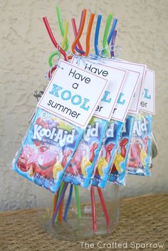 there are some candy sticks in a vase with tags on them that say i have a kool - aid summer