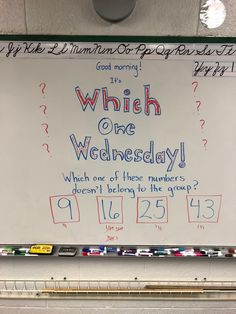 a white board with writing on it that says which one wednesday, which one of these numbers doesn't belong to the group