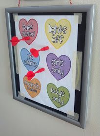 a bulletin board hanging on the wall with magnets