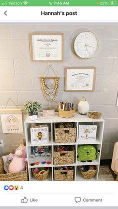 there is a shelf with baskets and books on it in front of a wall mounted clock