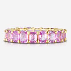 The perfect pop of color you need in your stack! 14k solid gold Scallop setting 3/4 band: 15 pink sapphire gemstones: 4 carats Eternity band: 20 pink sapphire gemstones: 4.95 carats (varies slightly by ring size) Width: 4 mm Pink Sapphire Wedding Band, Pink Sapphire Band, Sapphire Eternity Band, Diamond Ear Cuff, Necklace Length Guide, Bracelet Size Chart, Sapphire Wedding Band, Diamond Huggies, Ring Concierge