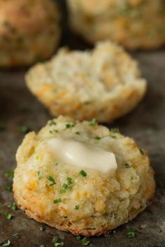 some food that is sitting on top of a baking sheet with something white in the middle