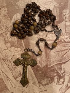 the rosary is next to an image of jesus