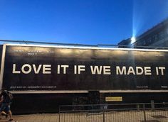 a large billboard on the side of a building that says love it if we made it