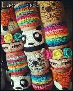 several crocheted stuffed animals are lined up together