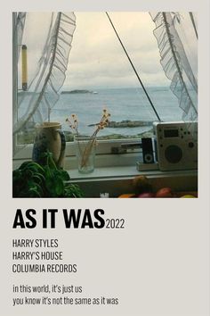 an advertisement for harry styles in front of a window with the ocean and sky behind it