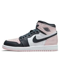 The Air Jordan 1 Retro High Atmosphere BP is a shoe made for little kids that takes the iconic silhouette and dresses it up in sharply contrasting hues. The upper part of the shoe is made from white leather, with quarter panels in an Obsidian color. The Swoosh is also rendered in Obsidian, as are the eyestay and forefoot overlay. The toe box, heel, and collar overlay are all rendered in pink patent leather, a nod to the bubble gum that Michael Jordan favored throughout his NBA career. The outsole is made from matching pink rubber and features a concentric-circle traction pattern that was originally developed for hardwood floors. (AJ1/SNKR/Basketball) Obsidian Color, Air Jordan 1 Retro High Og, Air Jordan 1 Retro High, The Bubble, Air Jordan 1 High, Air Jordan 1 Retro, Jordan 1 Retro High, Jordan 1 Retro, Michael Jordan