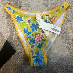 Brand New And Bright Colored Bottoms, From Heavy Manners. Green And Yellow With Florals. High Cut With Full Coverage So Very Safe For The Family Pool Party. Size Medium, I’d Say They Fit A Small/Medium. Spring Lemon Print Bottoms, Fitted Bottoms With Lemon Print For Spring, Yellow Bottoms With Floral Print For Spring, Yellow Floral Print Bottoms For Spring, Neon Yellow Stretch Swimwear For Spring, Trendy Neon Yellow Swimwear For Spring, Casual Yellow Swimwear, Yellow Lemon Print Bottoms For Summer, Yellow Bottoms For Spring Beach Outing