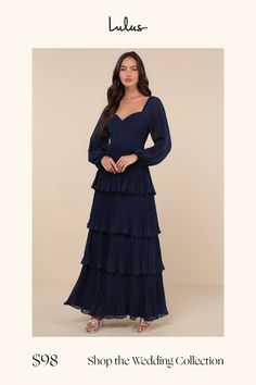 Let everyone be impressed by your stunning style in the Lulus Impactful Elegance Navy Blue Tiered Balloon Sleeve Maxi Dress! Airy, lightweight woven fabric shapes this gorgeous dress that has long balloon sleeves with elastic at the cuffs and shoulders. Sweetheart neckline tops a pleated bodice with a ruched detail at the front and a fitted waist. Accordion-pleated skirt falls in graceful tiers to a maxi hem. Hidden zipper/clasp at back. Fit: This garment fits true to size. Length: Floor length. Pleated Skirt Fall, Sweetheart Neckline Top, Dress With Pleats, Stunning Style, Bridal Party Dresses, Pleated Bodice, Long Balloons, Sleeve Maxi Dress, Long Sleeve Maxi