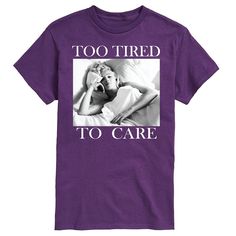 a purple t - shirt that says too tired to care