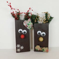 two brown paper bags decorated with christmas decorations