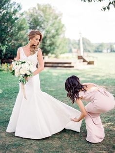 the bride and her mother are getting ready to walk down the aisle