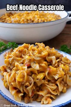 a plate full of noodles and meat with the words beef noodle casserole above it