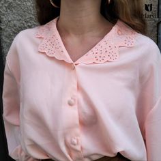 Vintage 60s blouse in perfect condition, retains the original buttons, has no defects, reflects the perfect Italian style of that period. Retro Collared Button Blouse, Retro Collared Blouse With Buttons, Feminine Vintage Fashion Blouse, Feminine Blouse For Vintage Fashion, Vintage Pink Button-up Blouse, Vintage Fashion Collared Blouse With Buttons, Retro Pink Button-up Blouse, Retro Blouse With Peter Pan Collar For Vintage Fashion, Vintage Collared Button Tops