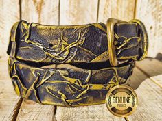 Discover the perfect blend of art and fashion with this stunning handmade leather belt. Crafted using a unique technique that creates a striking 3D texture, this belt stands out from the rest with its intricate design and vibrant colors. Features: Handcrafted Excellence: Each belt is meticulously made by hand, ensuring a one-of-a-kind piece for your wardrobe. 3D Texture:Unlike conventional flat belts, this belt features a dynamic 3D design that adds depth and interest. Vibrant Colors: Black with elegant touches of gold, creating a visually captivating accessory. Gold Pin Closure:Stylish gold pins not only secure the belt but also enhance its artistic appeal. Versatile Style:Perfect for dressing up jeans or adding a unique touch to your favorite dress or tunic. Specifications: - Material: H Artistic Fashion, Dress Up Jeans, Handmade Leather Belt, Art And Fashion, 3d Texture, Belt Black, Artist Style, Handcrafted Leather, Leather Belts