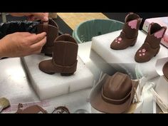 someone is making chocolate shoes out of fondant