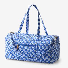 {"For quick weekend jaunts or adventures farther afield, hit the road (or friendly skies) with our chic, quilted duffel bag. Nice and roomy, it comes in fun original prints and is outfitted with an adjustable shoulder strap, two handles, inner and outer pockets, and leather trim; zip top. Complete the look with our matching tote and cosmetics bags, sold separately. Quilted duffel bag 100% cotton, with foam fill Great for travel, the roomy bag is patterned in your choice of exclusive prints Featu Duffel Bag Aesthetic, Quilted Duffle Bag, Camp Packing, Vera Bradley Duffle Bag, Cute Luggage, Dream Bags, Cosmetic Bag Set, Ibiza Fashion, The Company Store