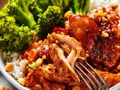 a close up of a plate of food with broccoli and chicken on it