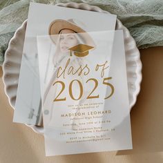 a class of 205 graduation card on a plate