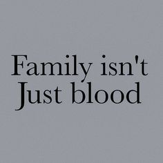 the words family isn't just blood against a gray background with black lettering on it