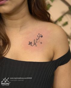 a woman with a tattoo on her chest