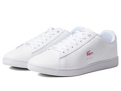 Lacoste Carnaby 222 3 SFA Sneaker - Women's Shoes : White/Gloss/Log/Marzipan/Java Blue : Complement your casual or dressy look by wearing the Lacoste Carnaby 222 3 SFA Sneaker and stay comfy. Upper is made of leather, polyurethane, and thermoplastic polyurethane. Polyester lining and insole. Lace-up closure. Round toe. Flat silhouette. Signature croc detail on the upper and heel collar. Rubber outsole. Imported. Weight of footwear is based on a single item, not a pair. Sporty Waterproof Sneakers For Spring, Waterproof Sporty Sneakers For Spring, Casual Waterproof Sneakers, Casual Waterproof Sneakers For Spring, Marzipan, Shoes White, White Gloss, Java, Converse Sneaker