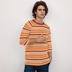 • 70s TShirt Style: Channel the groovy 70s vibe with this stylish maroon and orange stripe shirt, a must-have for any retro enthusiast.• Hippie Top Men: Embrace the carefree hippie style with this vintage-inspired shirt, perfect for casual and laid-back occasions.• Vintage Style Shirt Men: This shirt features a classic 70s design with bold stripes, offering a nostalgic and timeless look.• Hipster Shirt: Ideal for the modern hipster, this 70s inspired shirt in maroon and orange adds a unique touch to any outfit.Designed by Trendy Hip Buys in California. Made to order from overseas.● Fabric: Jersey(95% polyester and 5% spandex)● Regular fit● O-neck, 3/4 raglan sleeve● Fabric weight: 120g/m● Care Instruction: machine wash cold with similar colors, do not bleach, tumble dry low, do not iron, d Retro Long Sleeve T-shirt For Spring, Orange Cotton Top With Retro Print, Retro Orange Cotton Shirt, Brown Cotton Tops With Retro Print, Retro Brown T-shirt For Fall, Brown Retro Top With Relaxed Fit, Cotton Tops With Retro 70s Print, Retro Multicolor Long Sleeve T-shirt, 70s Inspired Cotton Tops With Retro Print