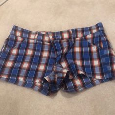 Hollister Plaid Shirts In Royal Blue With Orange And White . Size 1. Brand New With Tags . Fitted Plaid Casual Shorts, Fitted Casual Plaid Shorts, Casual Plaid Shorts, Hollister Jean Shorts, Cuffed Denim Shorts, Plaid Shirts, Hollister Shorts, Orange Plaid, Mid Rise Shorts